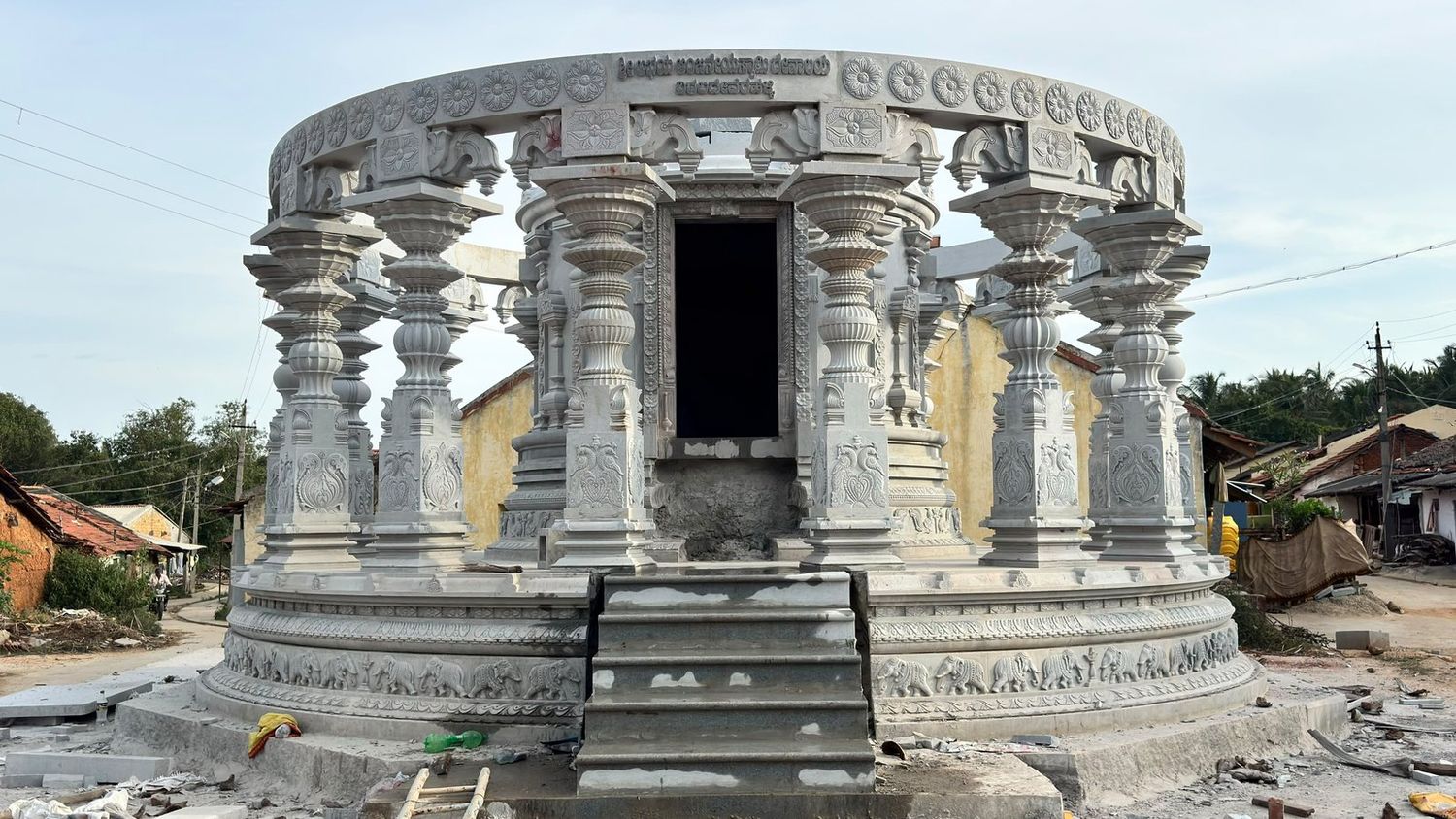 Completed circular stone mandapa with carved pillars