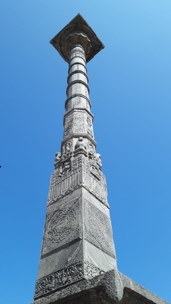 Carved granite flagstaff column seen from below